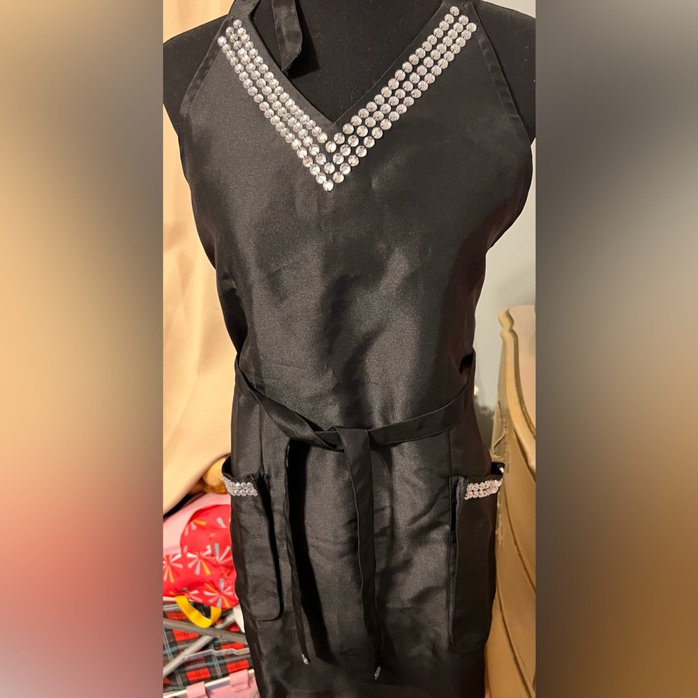 Apron by Joy Manganos. Fun black with rhinestones to spice up your cooking.